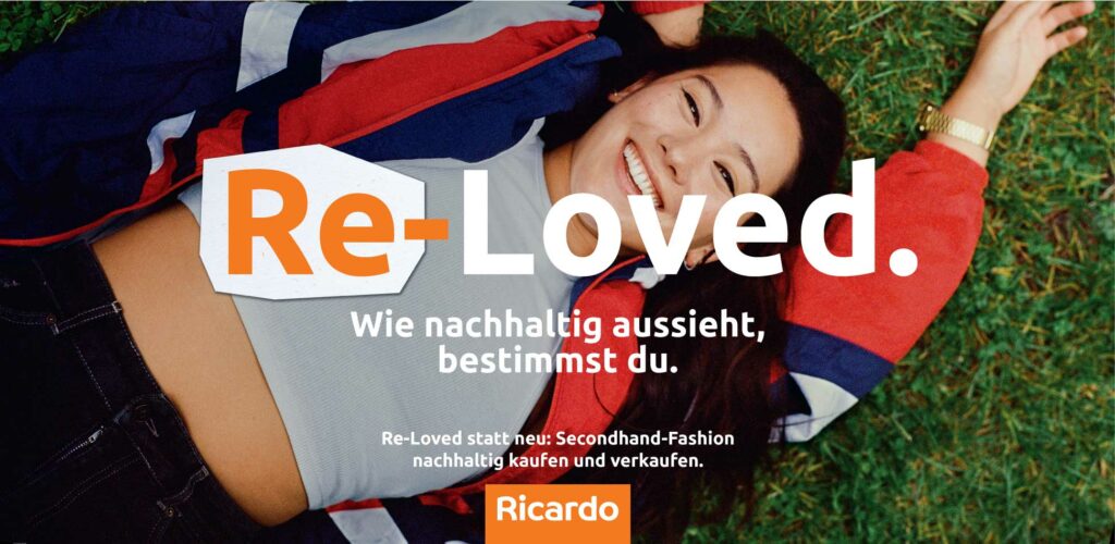 A woman lying on the grass, smiling, promoting secondhand purchases. The word Re-Loved is written in the Ricardo font.